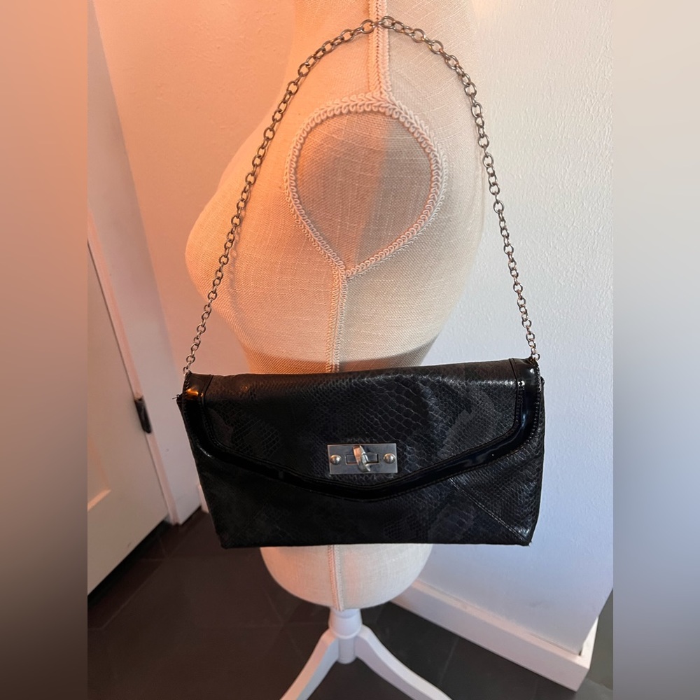 Small clutch with shoulder strap bag